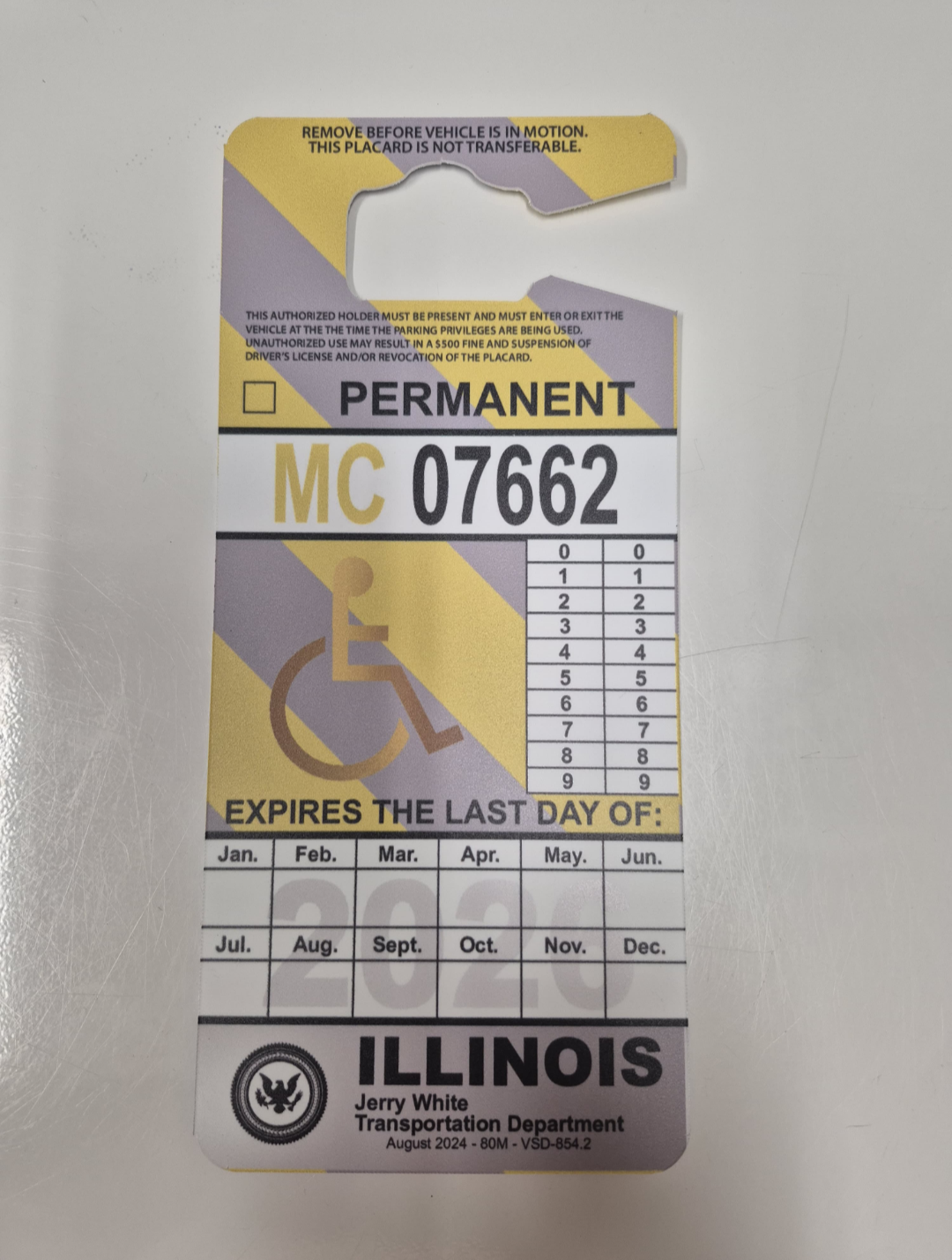 IL rear view mirror hang tag.